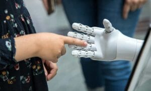 AI tools and outsourced teams working together for UK businesses