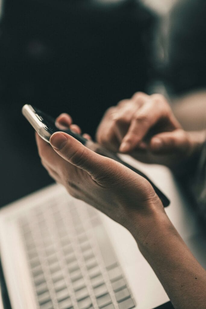 Person scheduling a free BPO consultation on smartphone